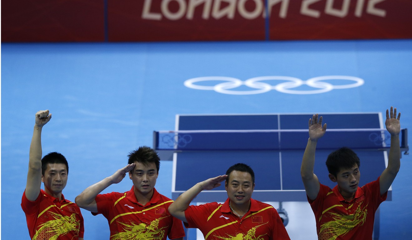 Popular Chinese table tennis coach Liu Guoliang (second right) was removed as head coach in 2017. Photo: Xinhua