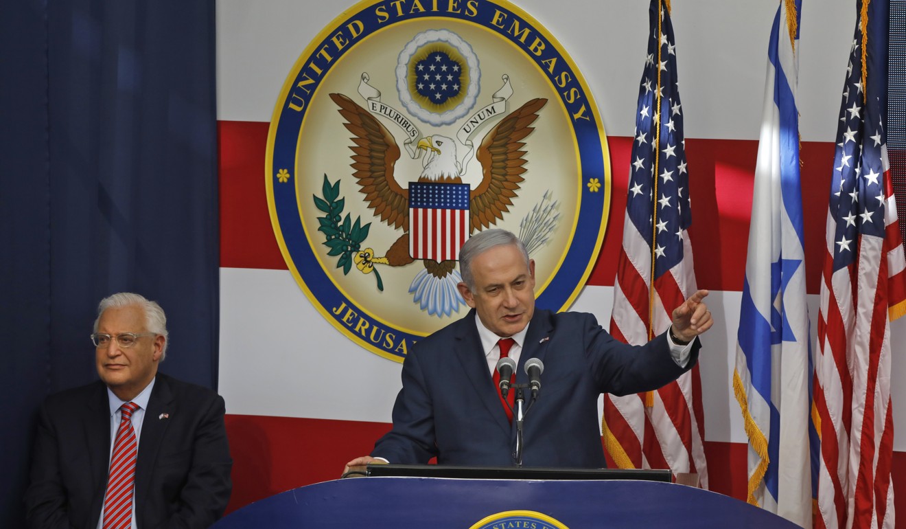 US ambassador to Israel David Friedman listens as Israel's Prime Minister Benjamin Netanyahu delivers a speech during the opening of the US embassy in Jerusalem in 2018. Photo: AFP