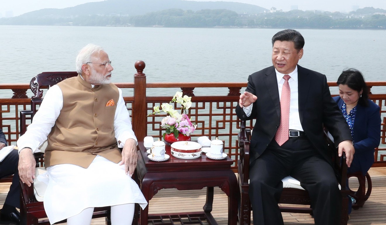 Indian Prime Minister Narendra Modi (left) and Chinese President Xi Jinping meet in Wuhan, capital of central China's Hubei province, in April last year. Photo: Xinhua