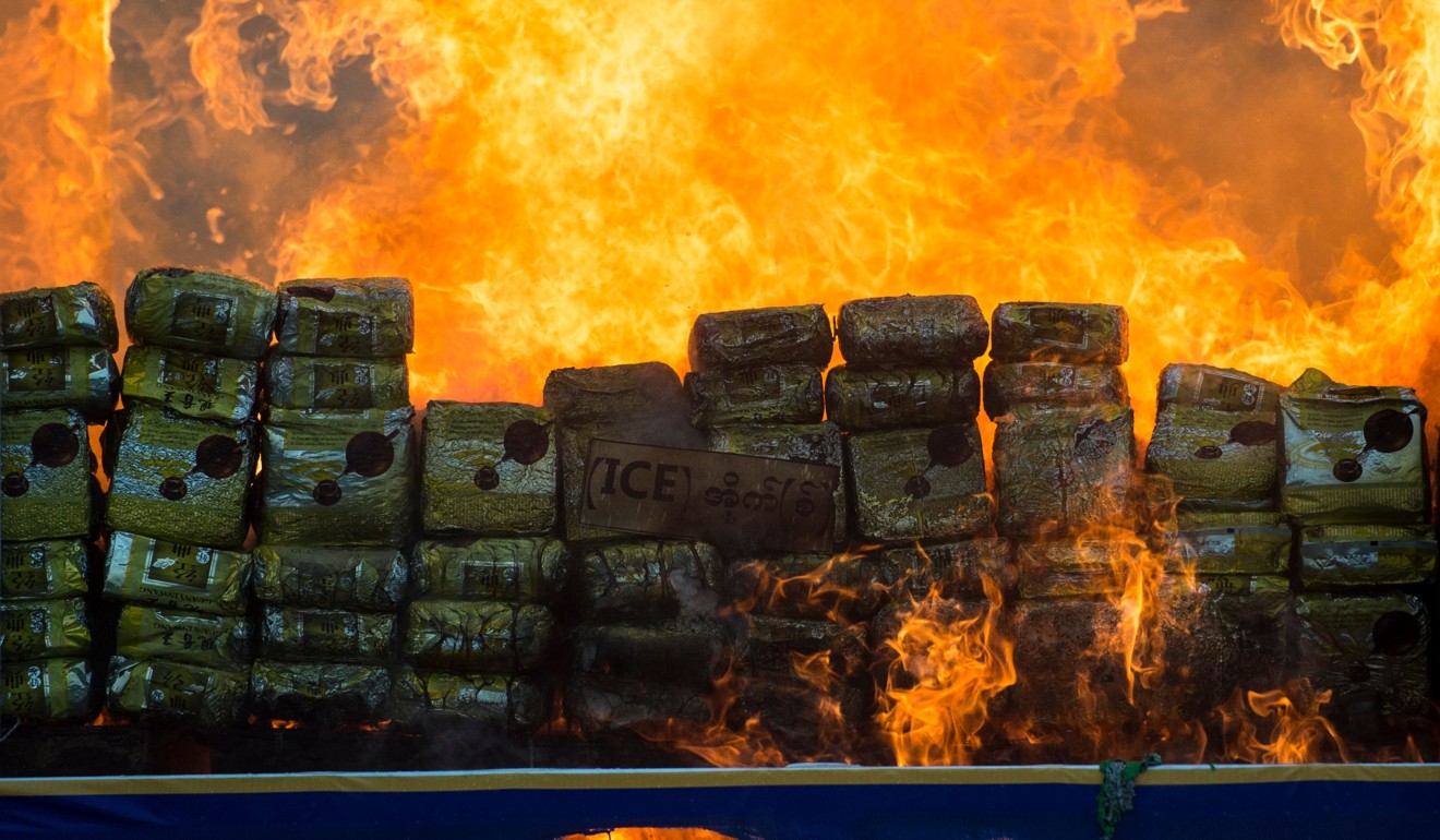 Myanmar law enforcement authorities burn seized illegal drugs worth US$187 million in June 2018. Photo: AFP