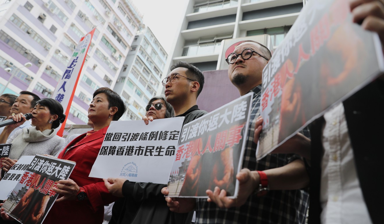 Pan-democrat lawmakers protest against the government’s proposal to amend Hong Kong’s extradition law to allow the transfer of fugitives to the mainland, Taiwan and Macau. Photo: Winson Wong