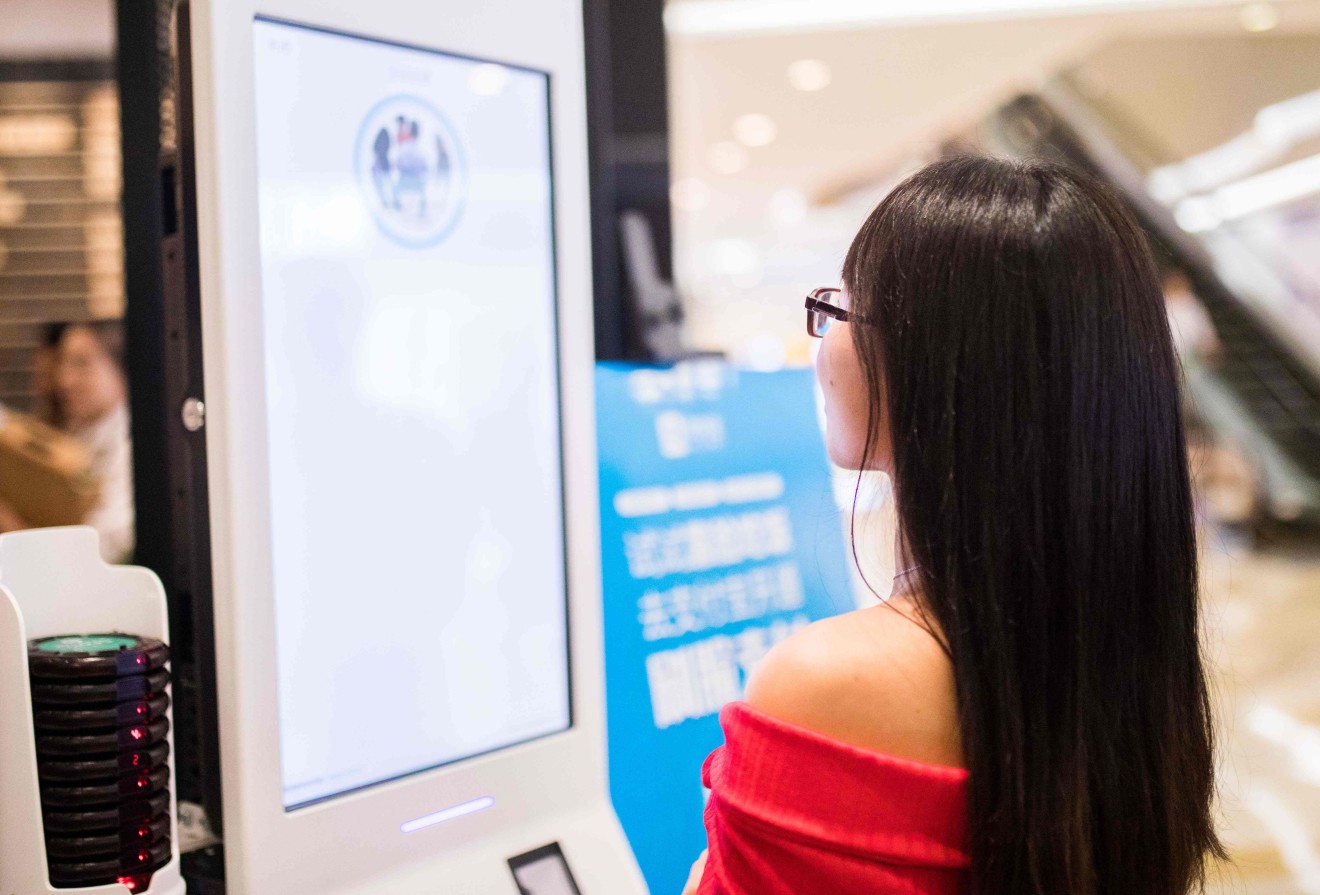 Facial recognition payment system "Smile to Pay" at a KFC fast food restaurant in Hangzhou in China's eastern Zhejiang province on September 1, 2017. (Picture: AFP PHOTO / STR / China OUT)