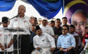 Malaysian Prime Minister Najib Razak speaks at a ceremony before the sailing of the Malaysian ship Nautical Aliya, carrying aid and supplies for Rohingya Muslims in Myanmar. Photo: AFP