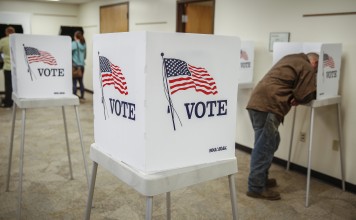 Murray Drohman, 35, votes in the 2016 presidential election at Jefferson County Fairgrounds in Golden, Colorado. Photo: AFP