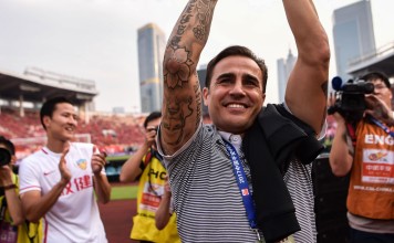 Fabio Cannavaro applauds the Tianjin Quanjian fans after his final game in charge, a victory against Guangzhou Evergrande. Photo: AFP