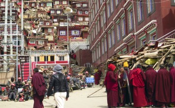 Eight months of demolition and expulsion has reduced the size of Larung Gar, a sprawling Buddhist centre of learning and prayer in the mountains of Sichuan. Photo: AP