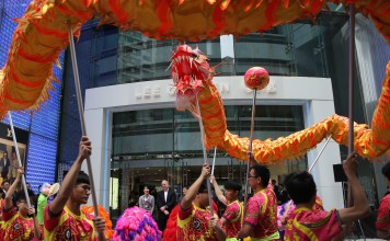 Dragon and lion dancers performing in Causeway Bay for Chinese New Year. Photo: Sam Tsang