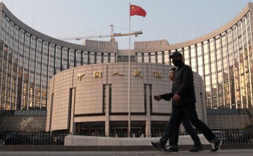 The People’s Bank of China uses short-term bill sales as a tool to absorb excessive cash from lenders when it wants to curb inflation or an overheating economy. Photo: Simon Song