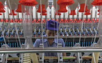 Labour costs for private businesses in China are expected to rise dramatically next year. Photo: EPA-EFE