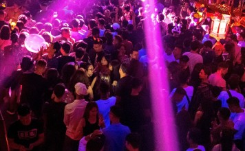 Vietnamese revellers dance at a nightclub in Hanoi, days after seven people died from a toxic cocktail of drugs at a dance festival in the city. Photo: AFP