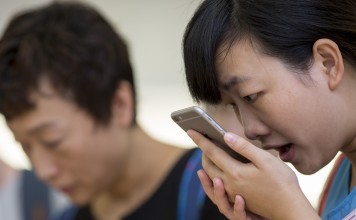 Chinese artificial intelligence company iFlytek is now removing politically sensitive words, phrases and names from its popular translation app, iFlyTranslate. Photo: Bloomberg