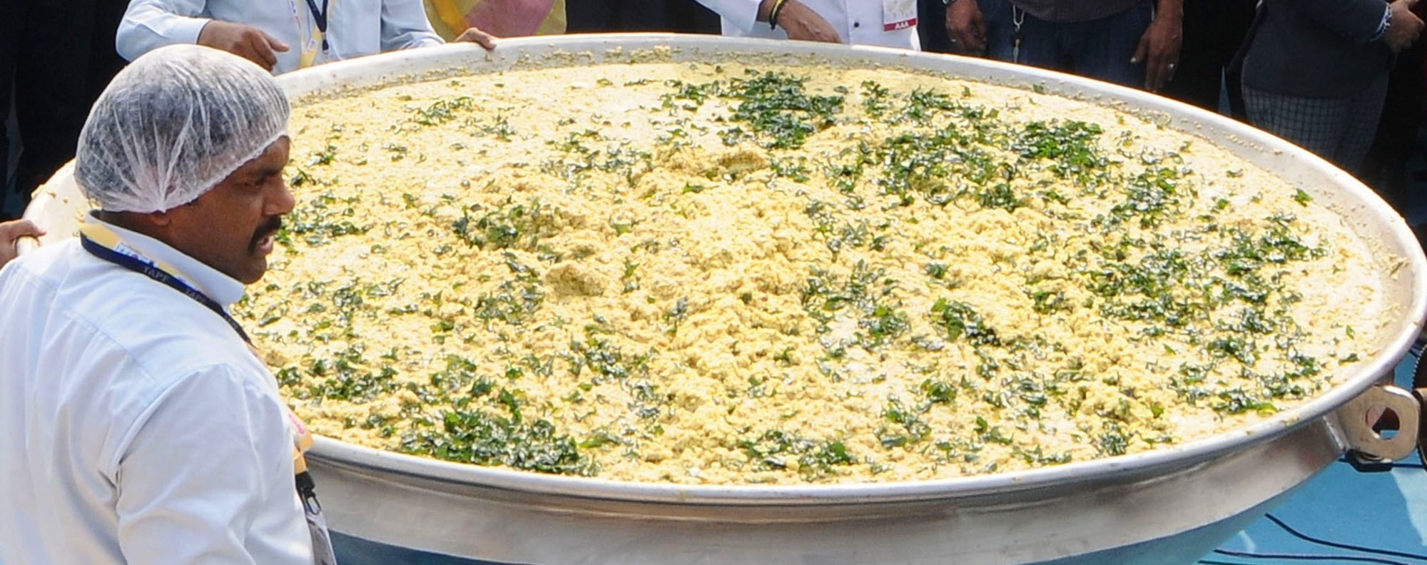 A giant wok containing khichdi.