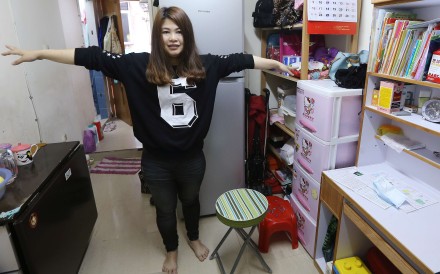 Mother Yan Nga-chi shows off her new-look furniture in her Sham Shui Po home. Photo: Dickson Lee