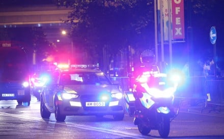 Police escorting cars arriving at the Grand Hyatt Hotel in Wan Chai. Photo: Dickson Lee