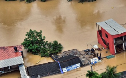 Friday’s flooding was caused by rivers bursting their banks, but unusually heavy rain triggered more than a dozen landslides burying homes on mountain slopes Friday’s flooding was caused by rivers bursting their banks, but unusually heavy rain triggered more than a dozen landslides burying homes on mountain slopes