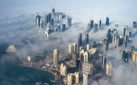 The sun rises over Doha in Qatar. Egypt, Saudi Arabia, Bahrain and the United Arab Emirates have cut off diplomatic ties with Qatar, citing its support for terrorism. Photo: EPA