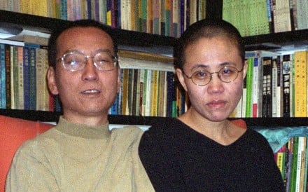 Campaigners are calling for the release of Liu Xia, pictured with her Nobel laureate husband Liu Xiaobo in 2002, who has yet to be given her freedom four months after her husband’s death. Photo: AFP