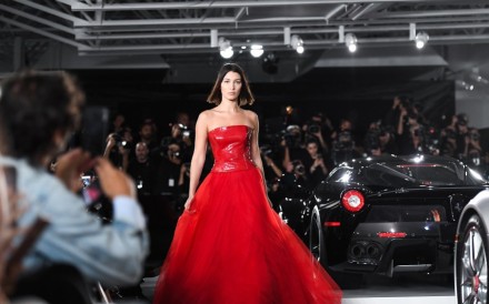 Model Bella Hadid dress in a red Ralph Lauren gown at the Ralph Lauren autumn 2017 collection runway show in New York in September 2017.