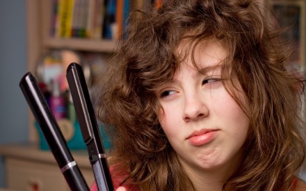 A hair iron is not the answer to frizzy hair.