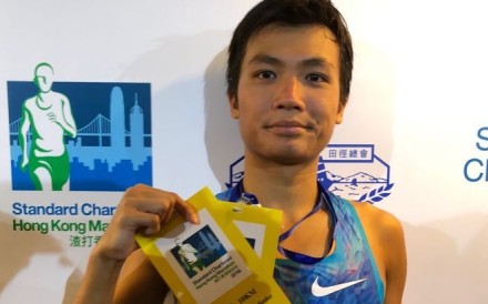 Abraham Kok Yu-hang, winner of the men's 10km race at the 2018 Hong Kong Marathon. Photo: Chan Kin-wa