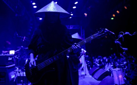 Chinese black metal band Zuriaake, or Lake of Buried Corpses, perform in Beijing. Band members use pseudonyms and never speak at their concerts. Photo: AFP