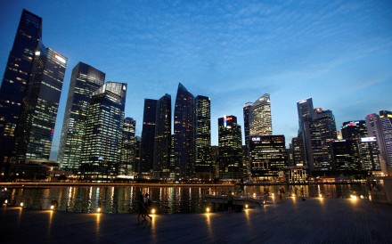 Securities and Futures Commission chairman Carlson Tong plays down the competition posed by Chinese stock exchanges despite their moves to attract new economy companies to list