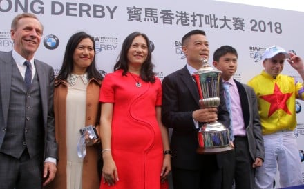 John Size (left) poses with connections of Hong Kong Derby winner Ping Hai Star. Photos: Kenneth Chan