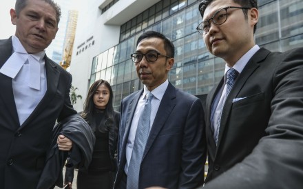 Wilson Fung (centre) was set to return to court in November. Photo: Nora Tam