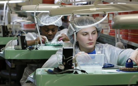 Both sides have benefited from trade ties, white paper says in response to accusations that China is trying to undermine rival’s manufacturing base