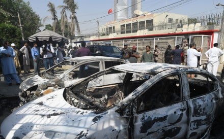 Burned out vehicles outside the Chinese consulate in Karachi following last month’s attack. Photo: AFP