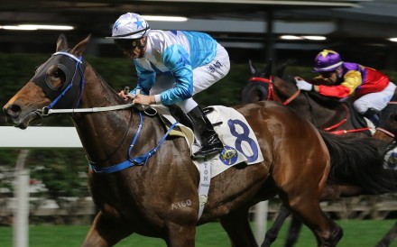 Smart Baby salutes under Zac Purton at Happy Valley on Wednesday night. Photos: Kenneth Chan
