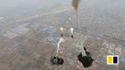 Chinese military’s airborne forces hold parachuting drill