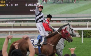 Douglas Whyte scores his sixth on Secret Sham. Photo: Kenneth Chan