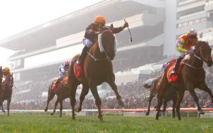 Able Friend (Joao Moreira, left) holds off the late rush of stablemate Designs on Rome (Tommy Berry, right) to win the Classic Mile. They clash again in the Classic Cup. Photo: Kenneth Chan