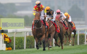 Tommy Berry's ride on Designs on Rome in the Classic Cup was the difference between winning and losing, as it played to the disadvantages of hot favourite Able Friend (Joao Moreira). Photo: Kenneth Chan
