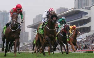 Dan Excel (Weichong Marwing) holds on to win last year's Champions Mile, in a race which only featured two international runners - English galloper Penitent and Kiwi veteran King Mufhasa. Photos: Kenneth Chan