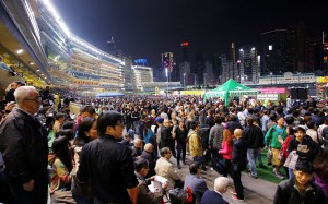 A packed Happy Valley crowd enjoys the beer garden. This sight won't be seen again until October. Photo: Kenneth Chan