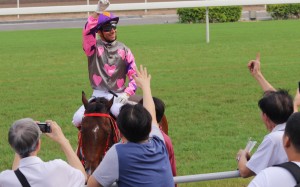 Joao Moreira returns to the winner's circle on Amazing Kids, to the delight of punters trackside at Sha Tin. It was the fourth of five winners for the jockey. Photos: Kenneth Chan