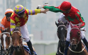 Tommy Berry on Designs On Rome and Joao Moreira on Helene Happy Star celebrate after John Moore’s pair finished one-two in the Hong Kong Gold Cup. Photo: Kenneth Chan