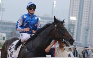 Zac Purton was all smiles after winning on promising Washington Heights in the last race. Photo: Kenneth Chan