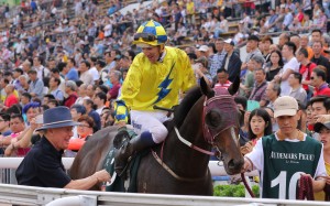 John Moore and Hugh Bowman celebrate after winning the QE II Cup with Werther. Photos: Kenneth Chan