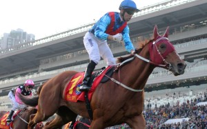 Joao Moreira pumps his first as Rapper Dragon wins the Hong Kong Classic Mile at Sha Tin on Sunday. Photos: Kenneth Chan