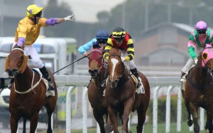 Neil Callan points at the crowd after taking out the Group Two Centenary Sprint at Sha Tin on Monday. Photos: Kenneth Chan