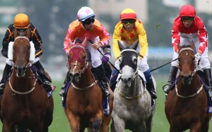 Tommy Berry (second from left) looks to connections after winning the Group One Queen’s Silver Jubilee Cup on Helene Paragon. Photos: Kenneth Chan