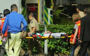 Chad Schofield is taken by stretcher to an ambulance on Wednesday night. Photos: Kenneth Chan