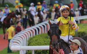 Matthew Poon is all smiles after winning aboard Penang Hall. Photos: Kenneth Chan