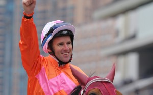 Tommy Berry celebrates Helene Paragon’s victory in the Group One Queen's Silver Jubilee Cup. Photos: Kenneth Chan