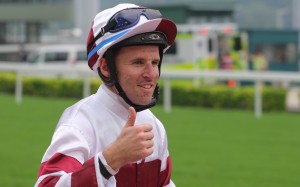 Tommy Berry celebrates his first winner of the season on Sunday after Hair Trigger scored in Class Three. Photos: Kenneth Chan.