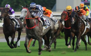 Karis Teetan gets out of trouble to guide talented grey Fifty Fifty to victory at Sha Tin on Sunday. Photos: Kenneth Chan
