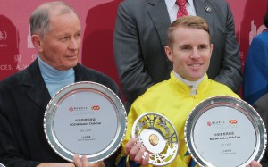 John Moore and Tommy Berry pose with their trophies after winning the Jockey Club Cup with Werther. Photos: Kenneth Chan